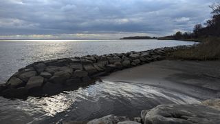 Rocks on the sandy shore.