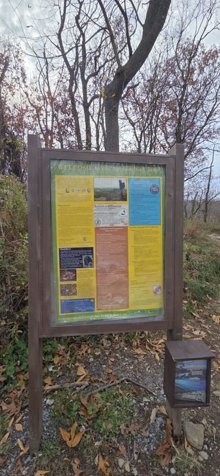 Signage for the Appalachian Trail detailing its history and what dangers to look out for.